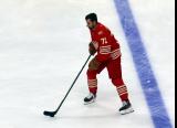 Dylan Larkin of the Detroit Red Wings skates at the blue line during pre-game warmups before a game against the Montreal Canadiens.