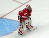 John Gibson of the Detroit Red Wings sets up at the top of his crease at the start of the second period of a game against the Carolina Hurricanes.