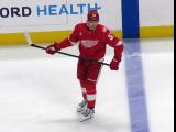 Moritz Seider of the Detroit Red Wings skates during pre-game warmups before a game against the Carolina Hurricanes, wearing a customized Sergei Fedorov jersey and white skates in honor of Fedorov's jersey retirement.