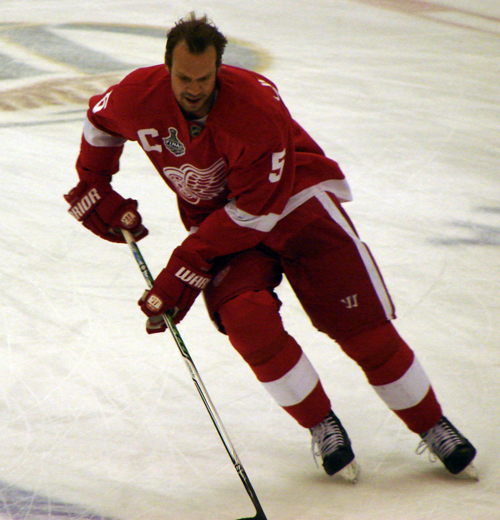 Nicklas Lidstrom carries the puck across the blue line during pre-game warmups.