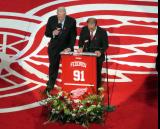 Red Wings television commentators Mickey Redmond and Ken Daniels speak at Sergei Fedorov's jersey retirement ceremony.