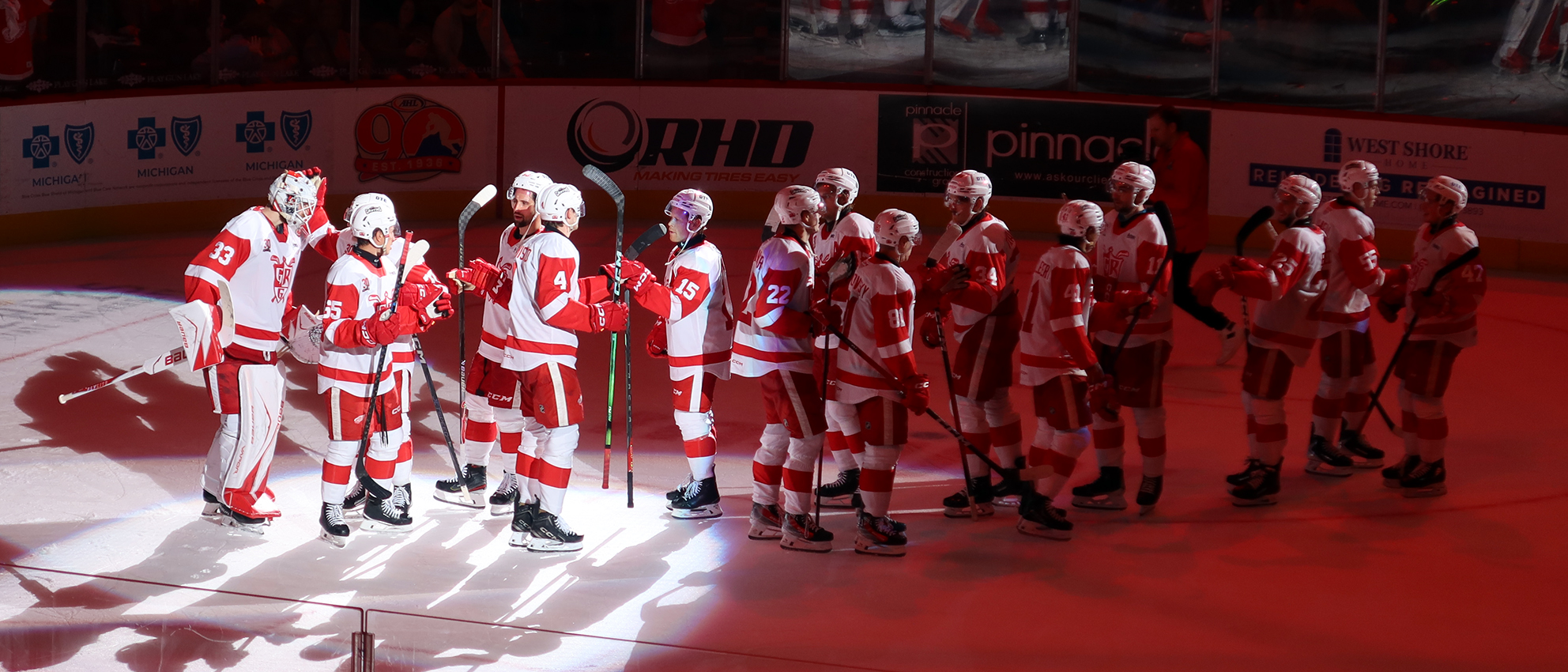 The Grand Rapids Griffins stream onto the ice to celebrate a win over the Manitoba Moose.
