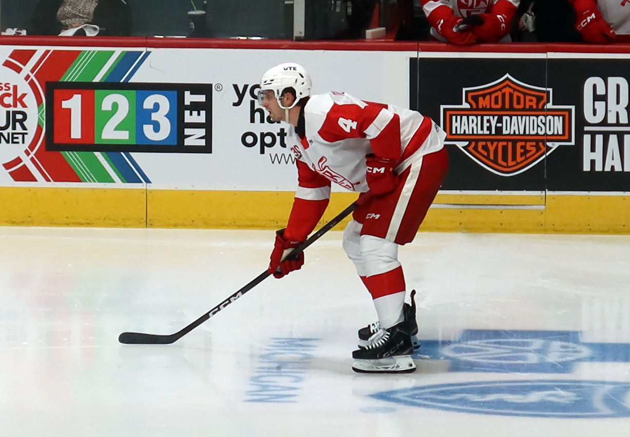 Antti Tuomisto of the Grand Rapids Griffins gets set for a faceoff during a game against the Manitoba Moose.