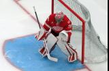 John Gibson of the Detroit Red Wings gets set in his crease during pre-game warmups before a game against the Carolina Hurricanes, wearing a customized Sergei Fedorov jersey in honor of Fedorov's jersey retirement.