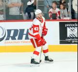 Carter Mazur of the Grand Rapids Griffins skates during pre-game warmups before a game against the Manitoba Moose.