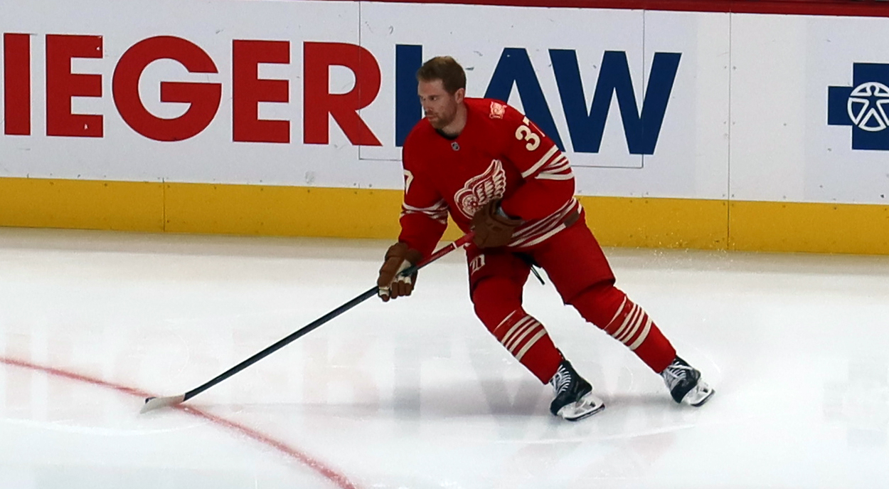 J.T. Compher of the Detroit Red Wings skates near the boards during pre-game warmups before a game against the Montreal Canadiens.