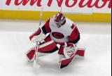 Frederik Andersen of the Carolina Hurricanes stretches during pre-game warmups before a game against the Detroit Red Wings.