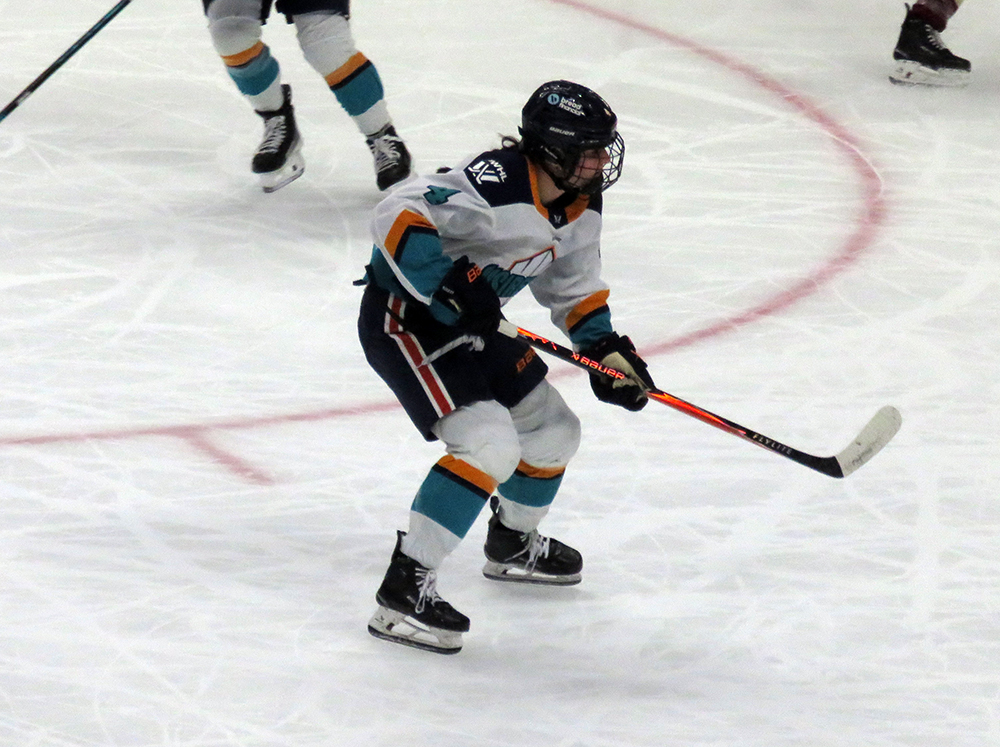 Ellie Hartje of the New York Sirens skates through the slot during the PWHL Takeover Tour Detroit game against the Montreal Victoire.
