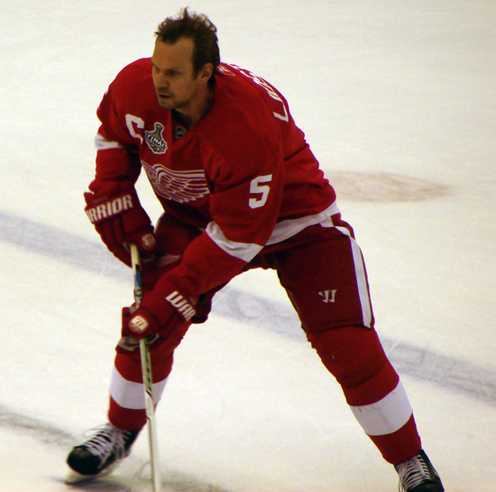 Nicklas Lidstrom carries the puck across the blue line during pre-game warmups.