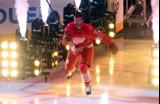 Michael Rasmussen of the Detroit Red Wings skates out during player introductions before the team's home opener.