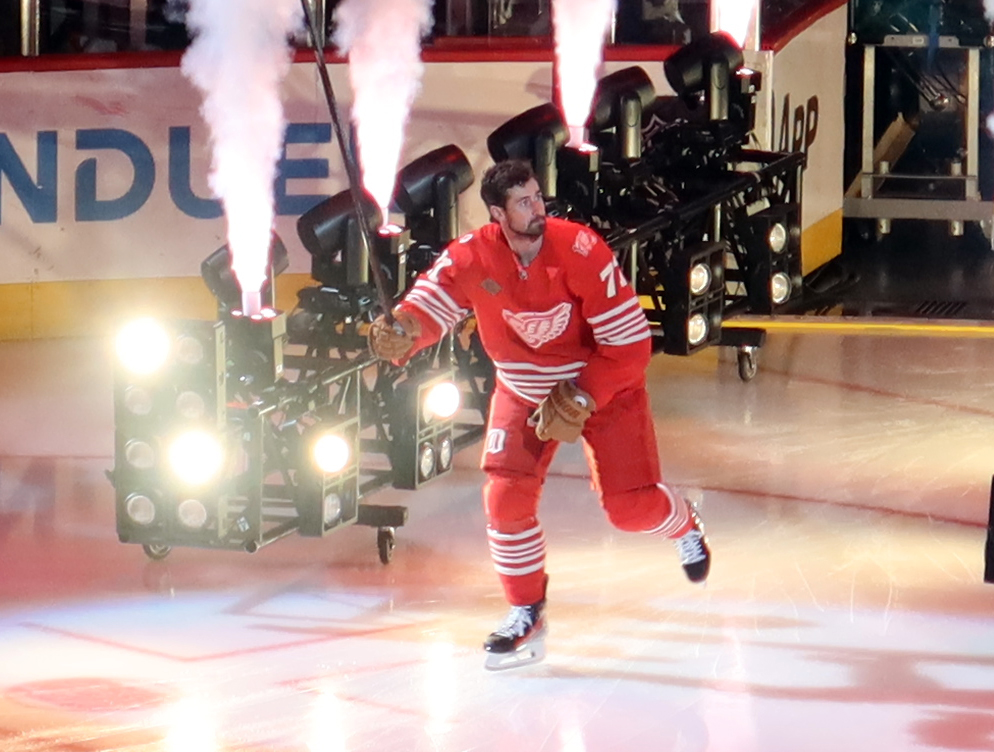 Dylan Larkin of the Detroit Red Wings skates out during player introductions before the team's home opener.