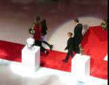 Sergei Fedorov and his family walk past some of the trophies he won over his career during his jersey retirement ceremony.