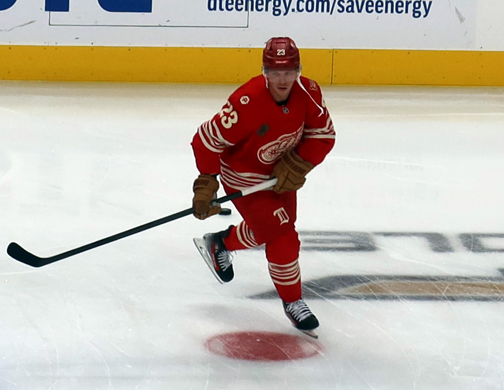 Lucas Raymond of the Detroit Red Wings skates in the neutral zone during pre-game warmups before a game against the Montreal Canadiens.