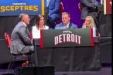 The PWHL Detroit delegation at the 2026 PWHL Entry Draft; goaltending coach Jimmy Howard, general manager Manon Rheaume, head coach Josh Sciba, and consultant Ellen Hughes.