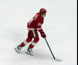 Jacob Bernard-Docker of the Detroit Red Wings skates during pre-game warmups before a game against the Carolina Hurricanes, wearing a customized Sergei Fedorov jersey and white skates in honor of Fedorov's jersey retirement.