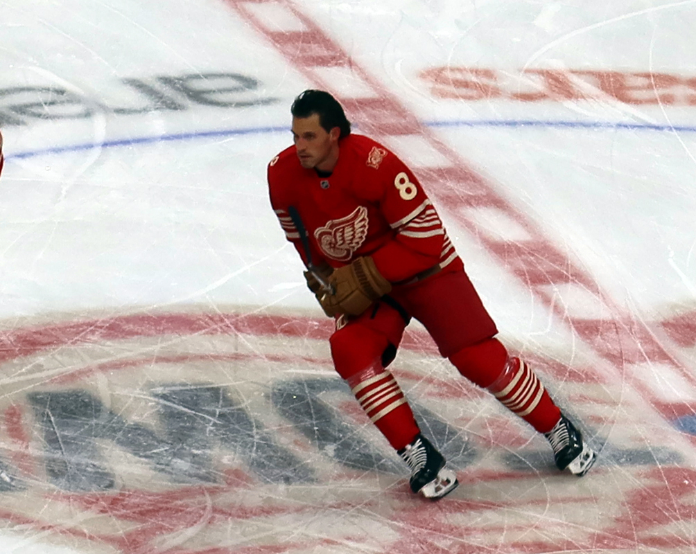 Ben Chiarot of the Detroit Red Wings skates at center ice during pre-game warmups before a game against the Montreal Canadiens.