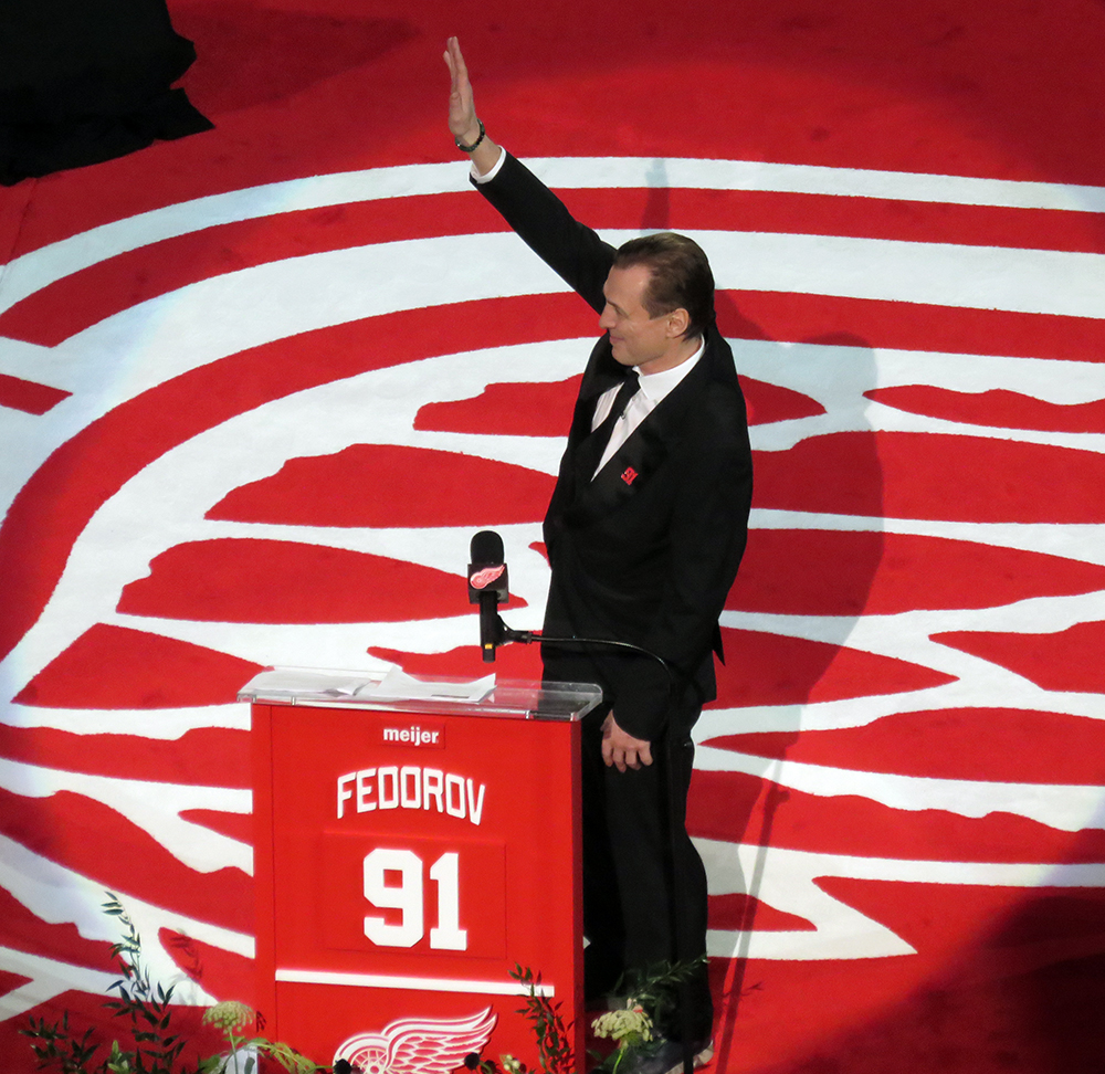 Sergei Fedorov waves to the crowd before speaking at his jersey retirement ceremony.