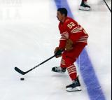Travis Hamonic of the Detroit Red Wings skates across the blue line during pre-game warmups before a game against the Montreal Canadiens.