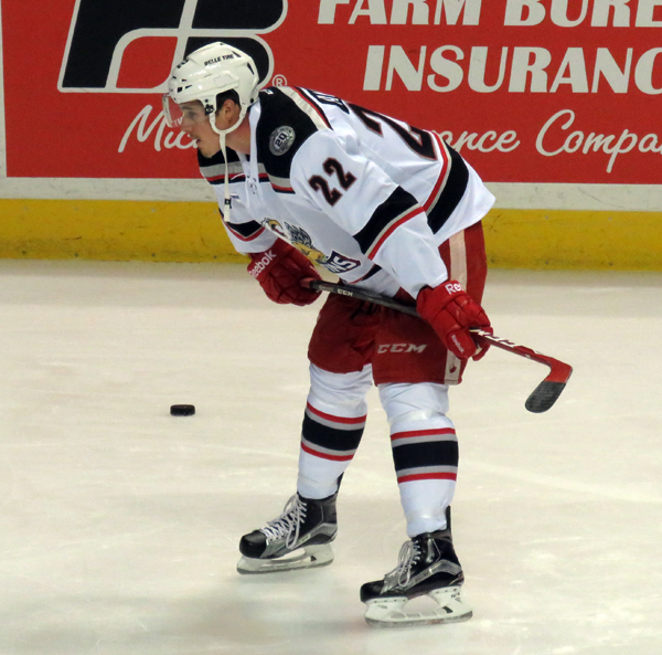 Louis-Marc Aubry crouches during pre-game warmups before a Grand Rapids Griffins game.