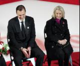 Sergei Fedorov sits next to Red Wings owner Marian Ilitch at Fedorov's jersey retirement ceremony.