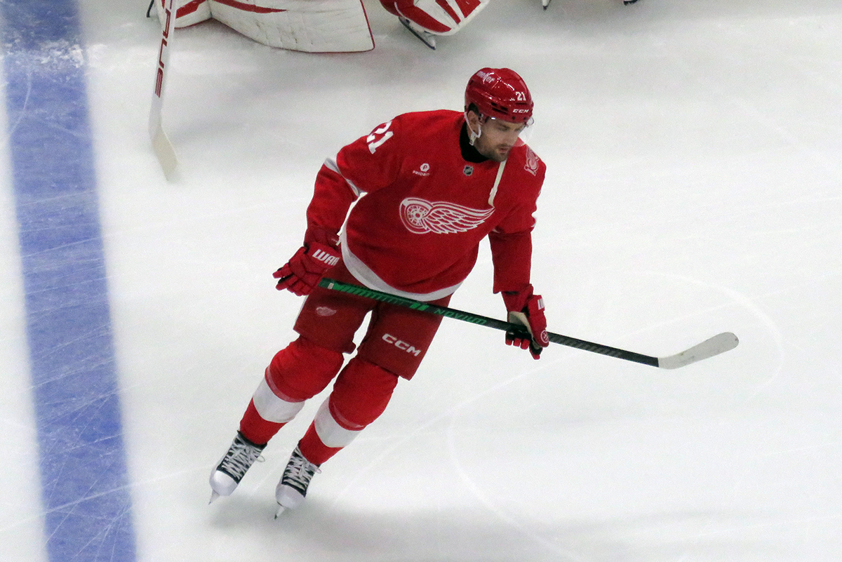 James van Riemsdyk of the Detroit Red Wings skates at the blue line during pre-game warmups before a game against the Carolina Hurricanes, wearing a customized Sergei Fedorov jersey and white skates in honor of Fedorov's jersey retirement.