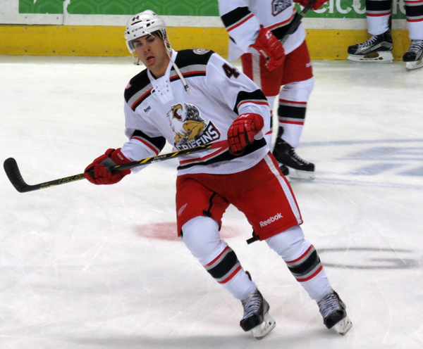 Joel Rechlicz skates in the neutral zone during pre-game warmups before a Grand Rapids Griffins game.