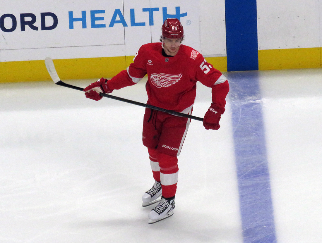 Moritz Seider of the Detroit Red Wings skates during pre-game warmups before a game against the Carolina Hurricanes, wearing a customized Sergei Fedorov jersey and white skates in honor of Fedorov's jersey retirement.