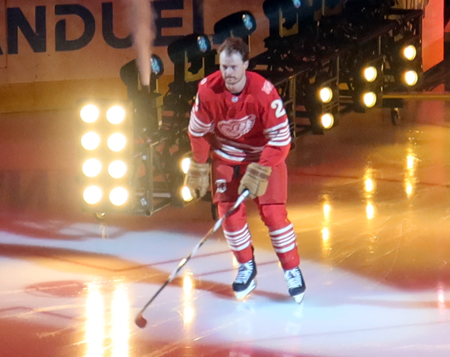 Mason Appleton of the Detroit Red Wings skates out during player introductions before the team's home opener.