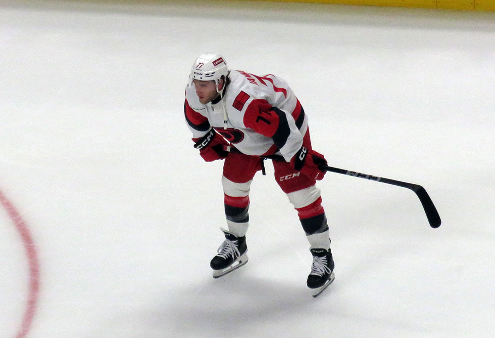 Mark Jankowski of the Carolina Hurricanes crouches during pre-game warmups before a game against the Detroit Red Wings.