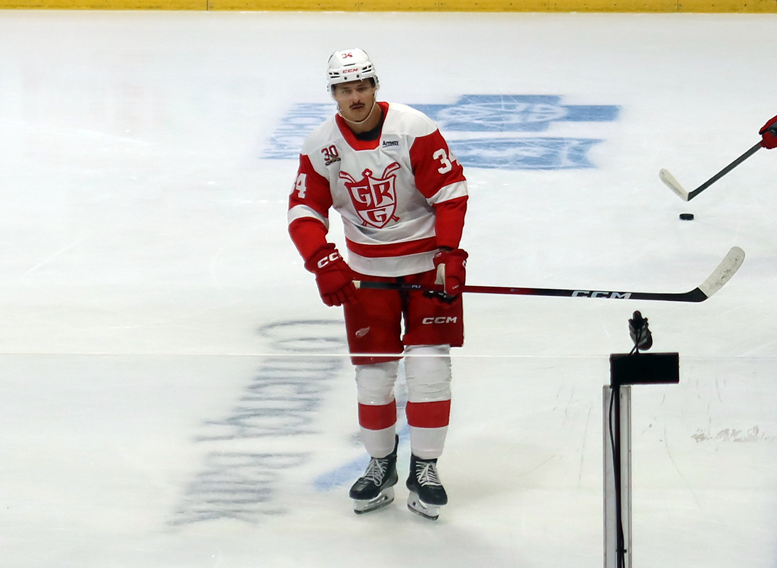 Eduards Tralmaks of the Grand Rapids Griffins skates during pre-game warmups before a game against the Manitoba Moose.