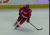 Andrew Copp of the Detroit Red Wings skates during pre-game warmups before a game against the Carolina Hurricanes, wearing a customized Sergei Fedorov jersey and white skates in honor of Fedorov's jersey retirement.