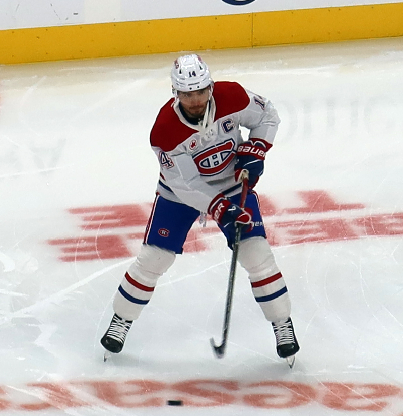 Nick Suzuki of the Montreal Canadiens skates in the neutral zone during pre-game warmups before a game against the Detroit Red Wings.