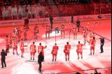 The Detroit Red Wings salute their fans from center ice after player introductions at the start of their home opener.