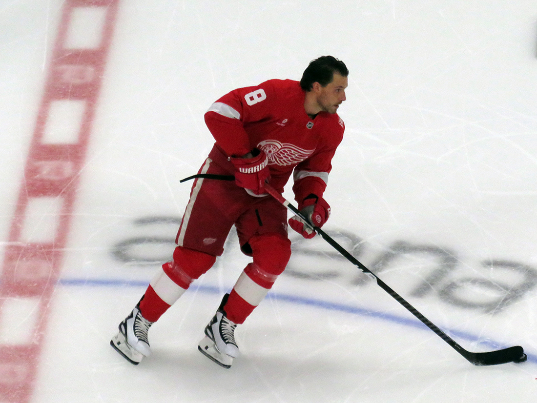 Ben Chiarot of the Detroit Red Wings skates at center ice during pre-game warmups before a game against the Carolina Hurricanes, wearing a customized Sergei Fedorov jersey and white skates in honor of Fedorov's jersey retirement.