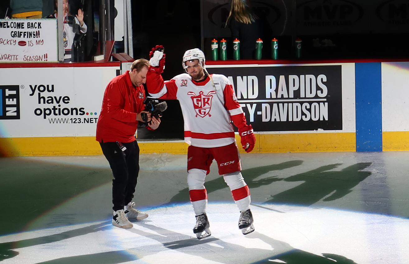 Carter Mazur of the Grand Rapids Griffins salutes the crowd as the third star of a win over the Manitoba Moose.
