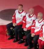 Nicklas Lidstrom and Mark Howe sit with family representatives of other Red Wings legends during Sergei Fedorov's jersey retirement ceremony.
