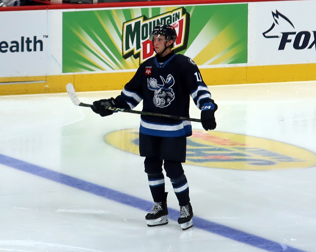 Brad Lambert of the Manitoba Moose skates during a stop in play in a game against the Grand Rapids Griffins.