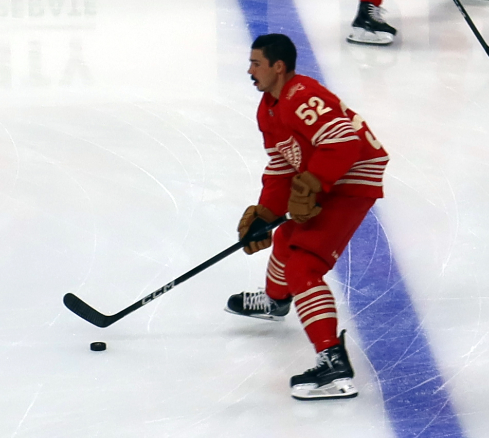 Travis Hamonic of the Detroit Red Wings skates across the blue line during pre-game warmups before a game against the Montreal Canadiens.