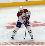 Nick Suzuki of the Montreal Canadiens skates in the neutral zone during pre-game warmups before a game against the Detroit Red Wings.