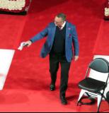 Steve Yzerman steps onto the stage at Sergei Fedorov's jersey retirement ceremony.