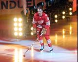 Mason Appleton of the Detroit Red Wings skates out during player introductions before the team's home opener.