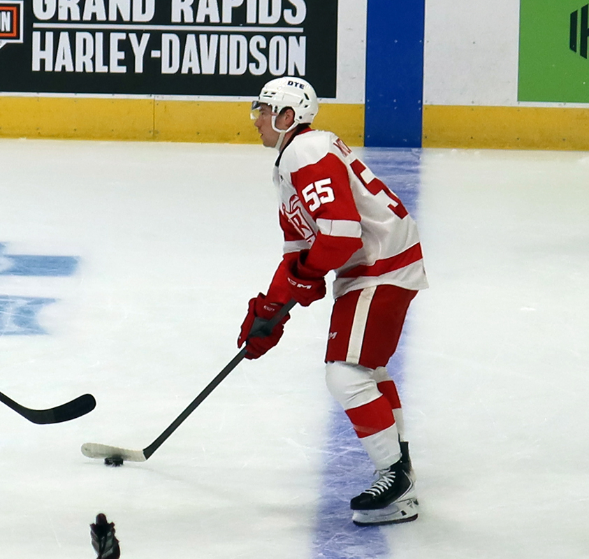 Ian Mitchell of the Grand Rapids Griffins skates across the blue line during pre-game warmups before a game against the Manitoba Moose.