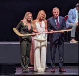 Vivian Jungels is selected eleventh overall at the 2026 PWHL Entry Draft, flanked by PWHL senior vice president Jayna Hefford and Ottawa Charge general manager Michael Hirshfeld.