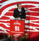 Ken Daniels stands at the podium during Sergei Fedorov's jersey retirement ceremony.
