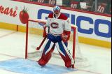 Jakub Dobes of the Montreal Canadiens stands in his crease during pre-game warmups before a game against the Detroit Red Wings.