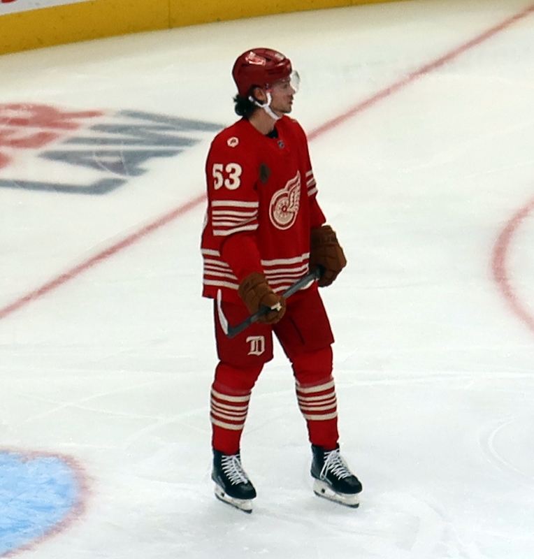 Moritz Seider of the Detroit Red Wings stands near the crease during a stop in play in a game against the Montreal Canadiens.
