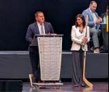 PWHL Detroit head coach Josh Sciba steps to the podium alongside general manager Manon Rheaume to announce the team's sixth-round pick in the 2026 PWHL Entry Draft.