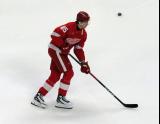 Elmer Soderblom of the Detroit Red Wings skates during pre-game warmups before a game against the Carolina Hurricanes, wearing a customized Sergei Fedorov jersey and white skates in honor of Fedorov's jersey retirement.