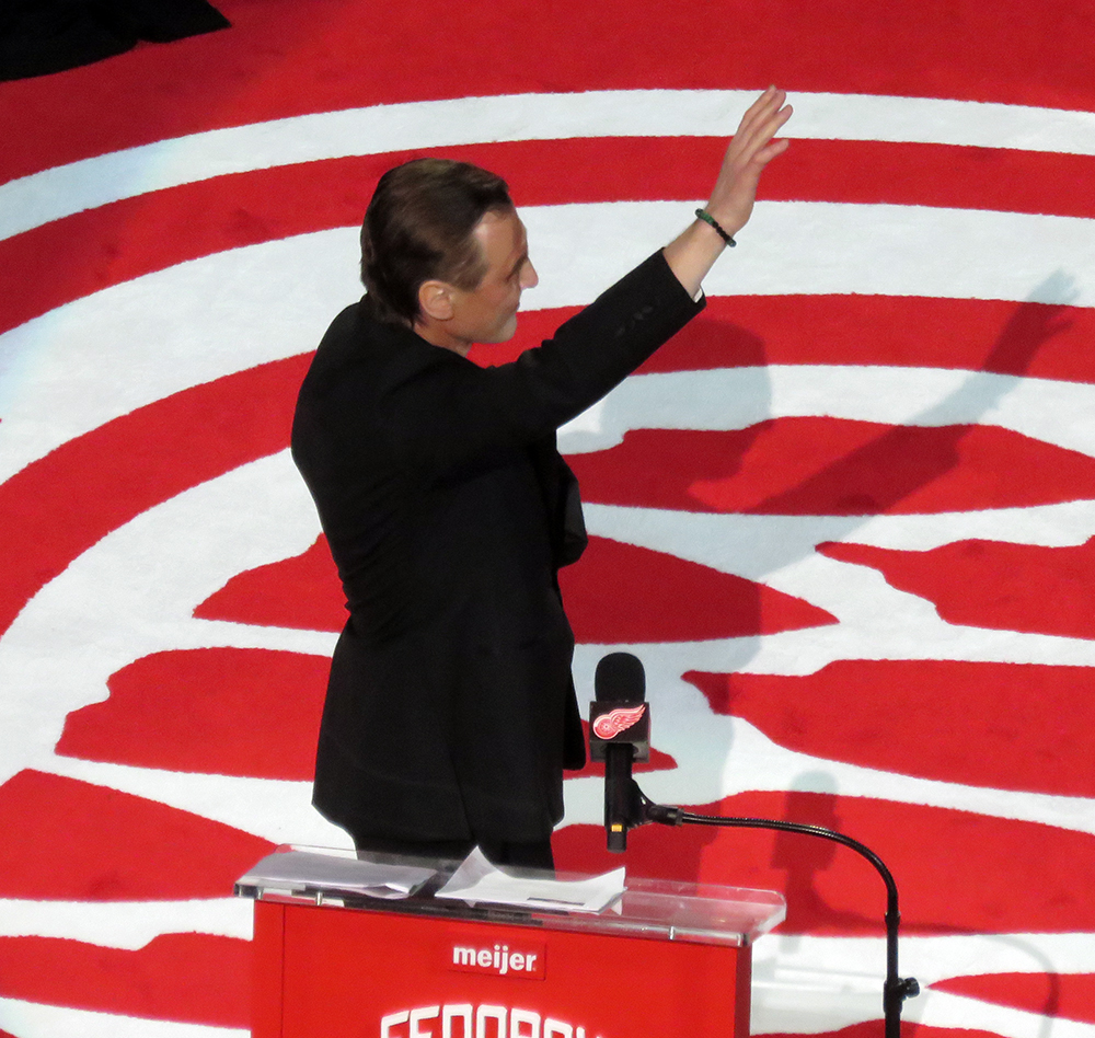 Sergei Fedorov waves to the crowd after speaking at his jersey retirement ceremony.