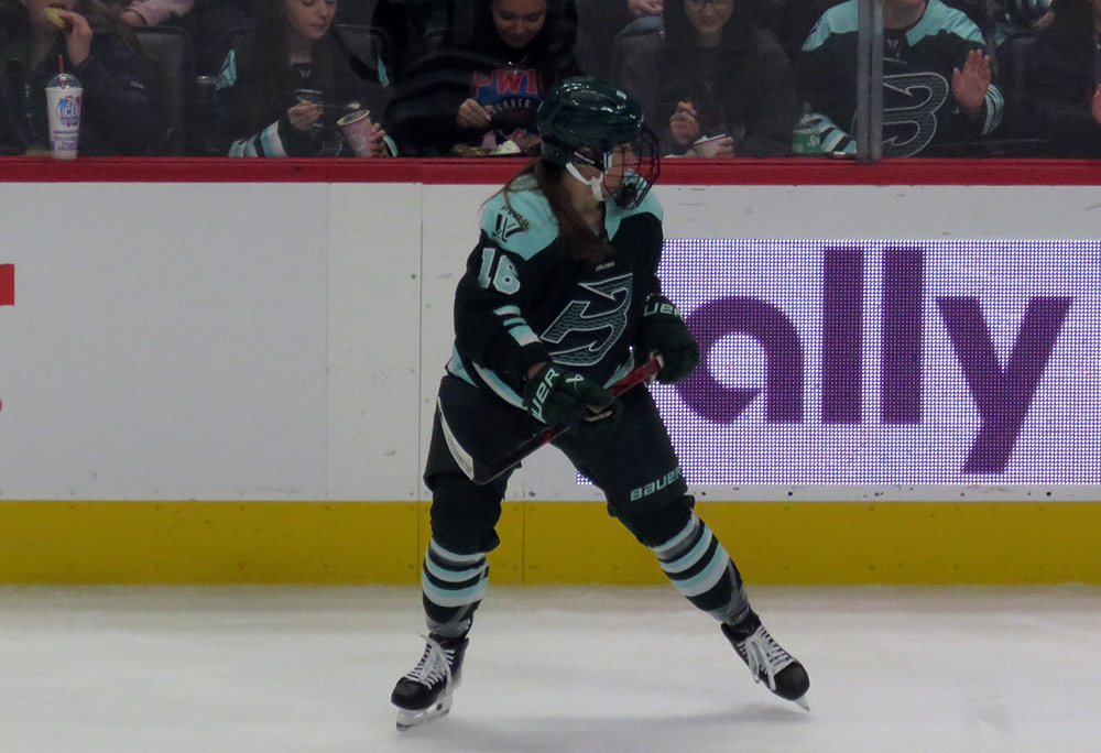 Riley Brengman of the Boston Fleet skates near the boards during the PWHL Takeover Tour Detroit game against the Vancouver Goldeneyes.
